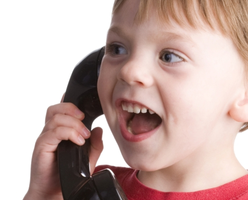 Child using a telephone