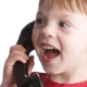 Child using a telephone